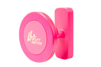 Lift Hotter magnetic gym phone mount in signature pink — front view showing circular disk face with gold LH logo and wall plate