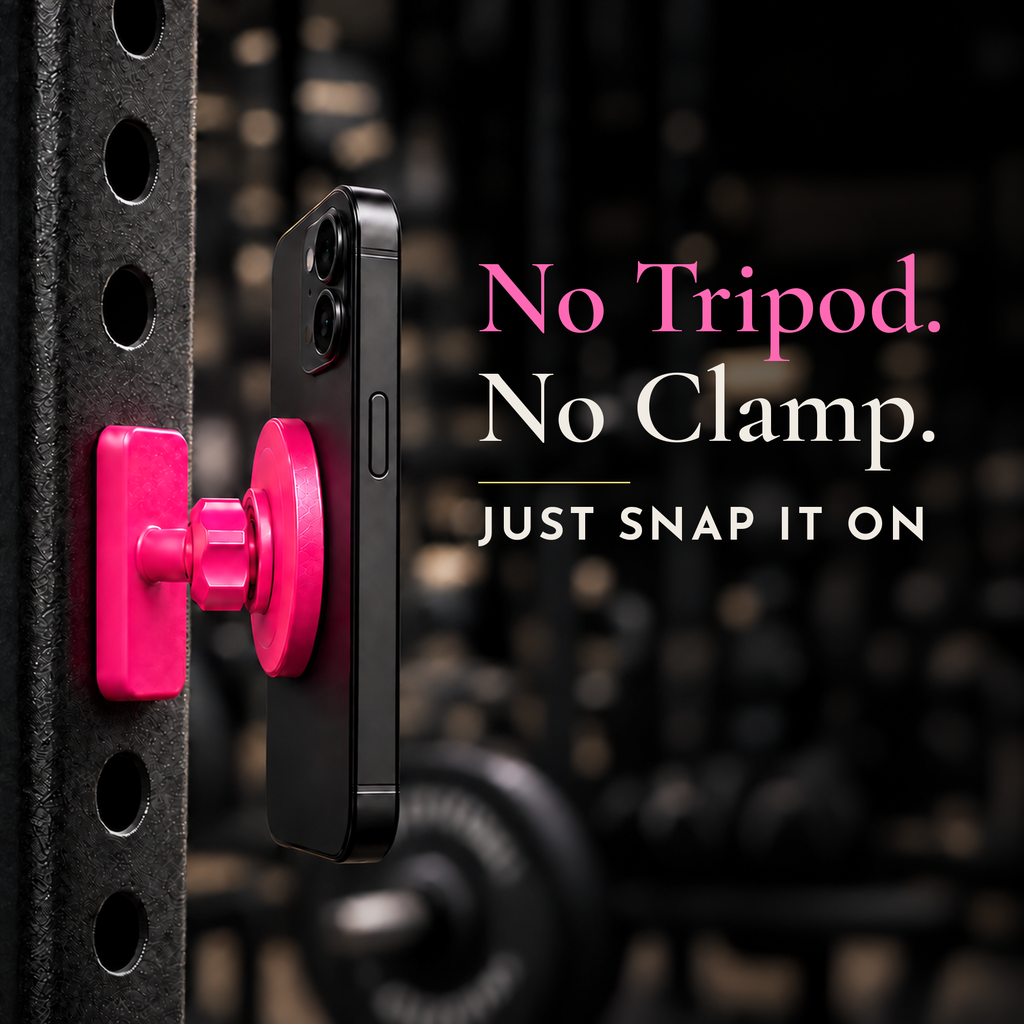 Pink Lift Hotter magnetic gym phone mount holding a phone on a squat rack, no tripod or clamp needed